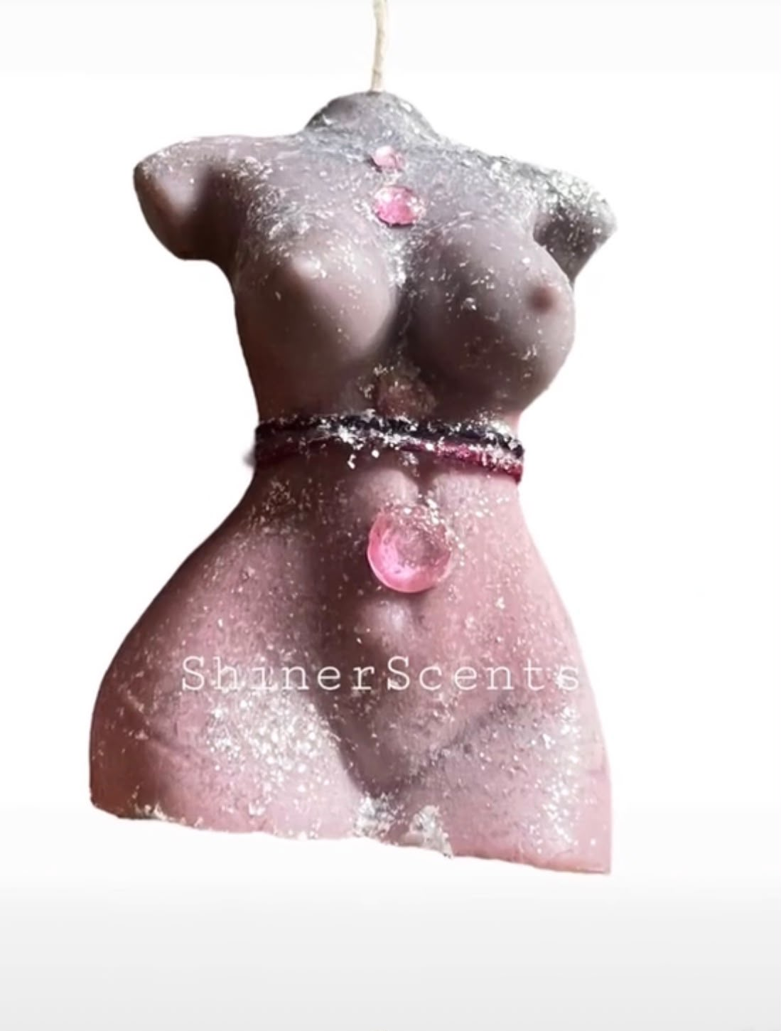 Mauve glitter-accented handcrafted female torso candle